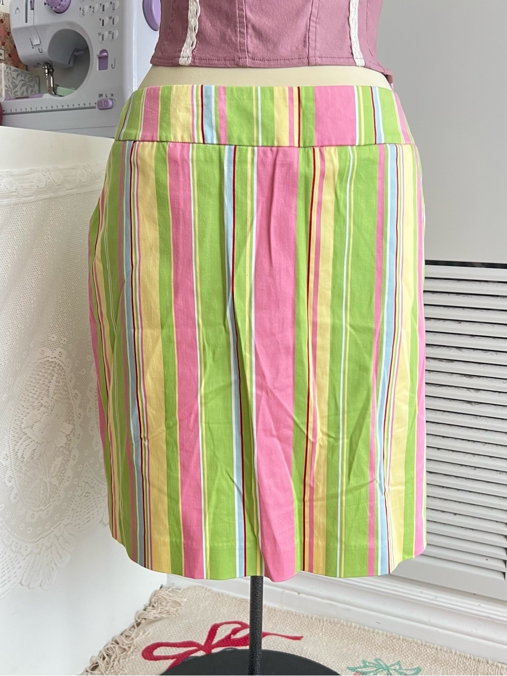 Loudmouth Ladies pink, green, and yellow vertical striped midi skort